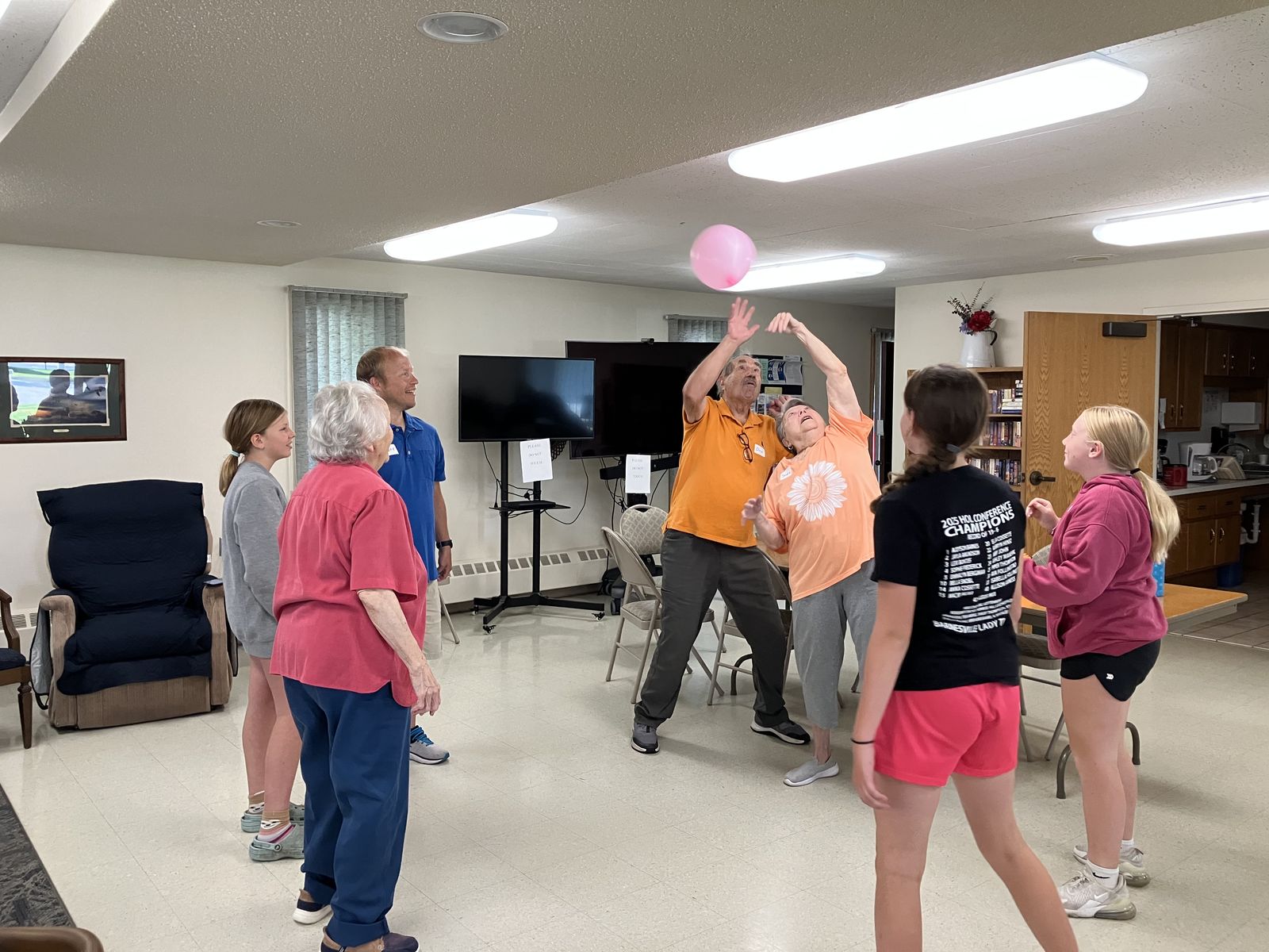 DayBreak participants enjoying a balloon game together