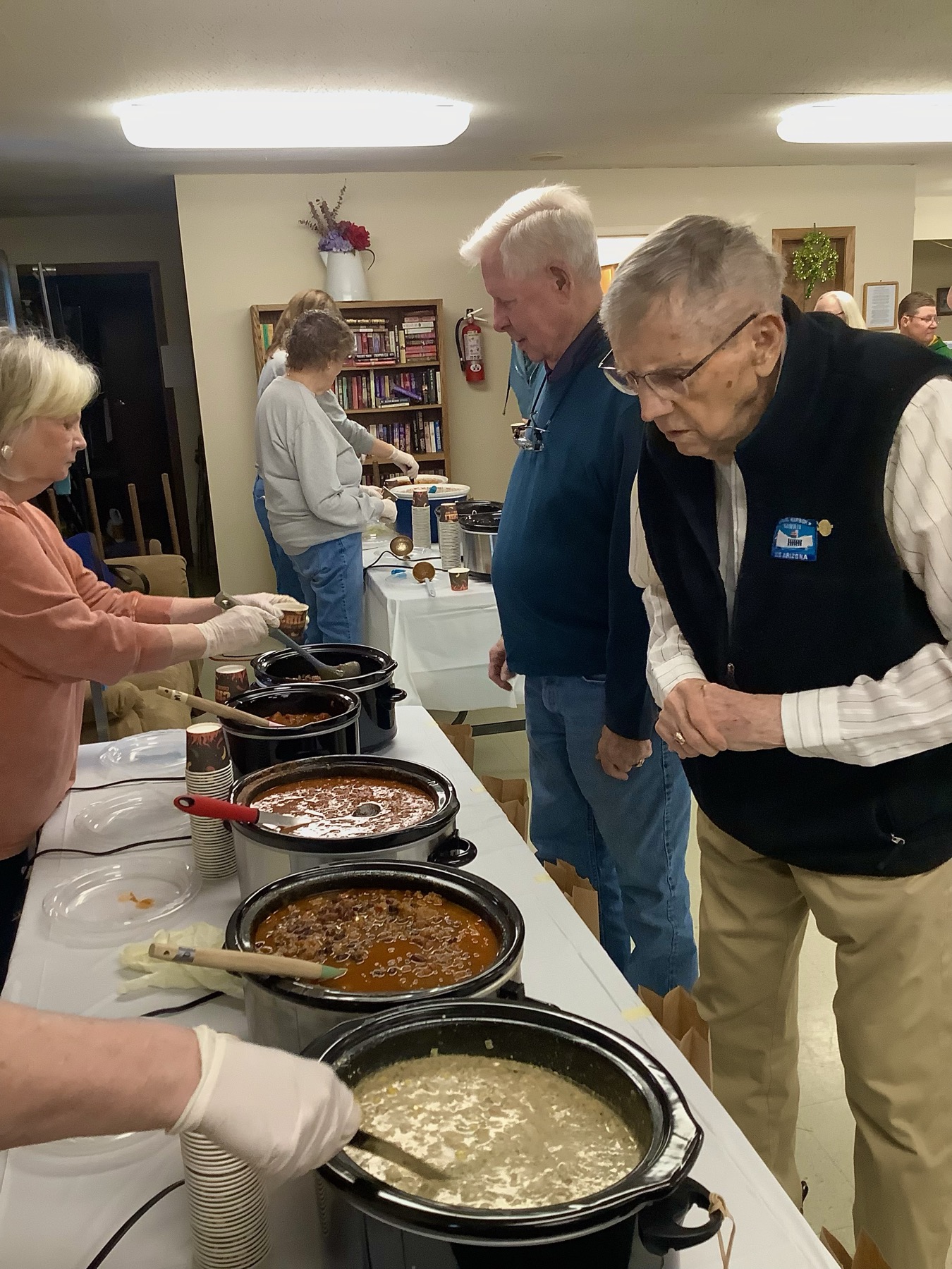 Volunteers serving a community meal